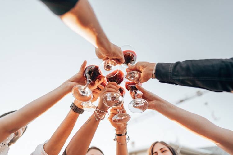 friends enjoying wine together at harvest wine and food festival